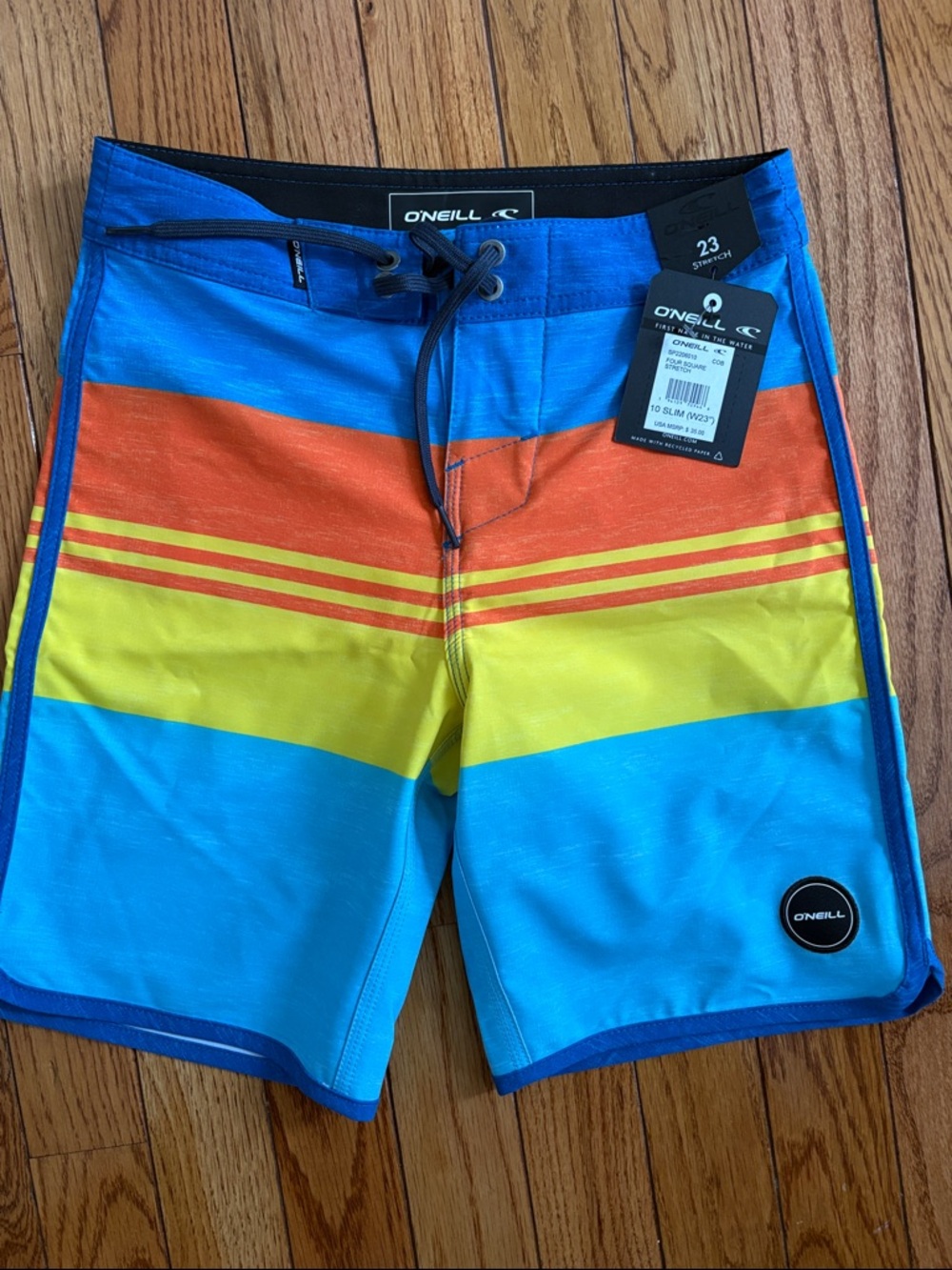 O'Neill Blue Orange Yellow Striped Kids Swim Trunks